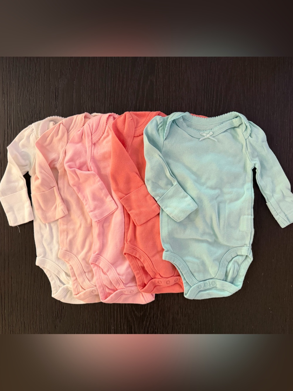 Small Story Long-Sleeve Baby Bodysuit in Pink hues